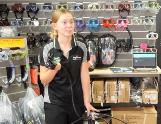 Girl showing scuba